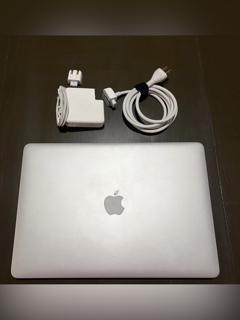 Apple Silver MacBook with White Charger and Cable